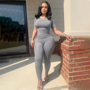 Close-up detail of grey ribbed two-piece high-stretch plus size women's activewear set