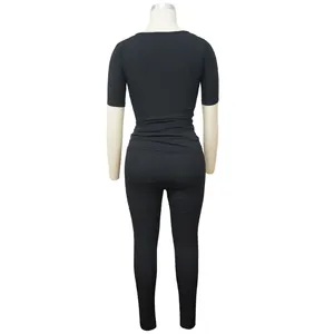 Detailed back view of a black ribbed high-elastic sports two-piece set for women