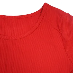 Close-up detail of the red ribbed high-elastic crew neckline on this women's sports set