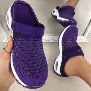 Close-up detail of purple fly-knit mesh breathable air cushion wedge sandal for women