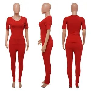 Three-angle display showing front side and back of a red ribbed high-stretch two-piece set