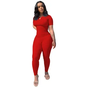 Two-piece red ribbed high-stretch sports set for women with short sleeve top and leggings