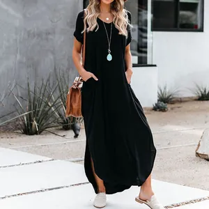Full-length casual black maxi dress featuring pockets and a chic side slit detail