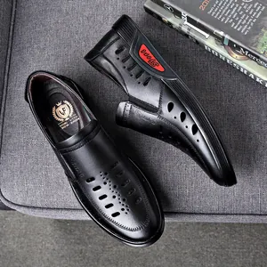 Stylish black leather hollow-out loafers for men in a sophisticated business casual style