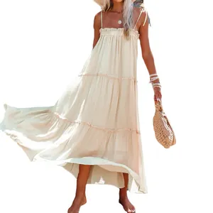 Elegant beige spaghetti strap tiered maxi dress for summer beach vacation