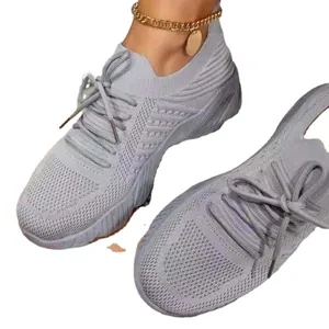 Breathable light grey fly-knit mesh sneakers for women casual running and outdoor activities