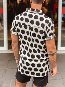 Detailed back view of men's slim fit white short sleeve shirt with large black polka dots