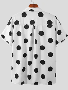 Back view of men's short sleeve summer shirt featuring large black polka dot print on white.