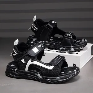 Detailed side view of breathable black boys sports sandals with adjustable straps