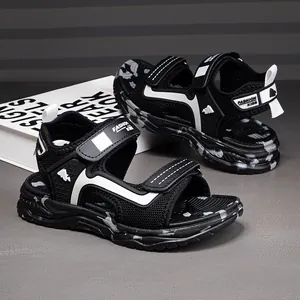 Black and white breathable boys' sports sandals with camouflage sole and velcro straps