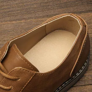 Detail of the cushioned heel and premium lining of men's burnished leather shoes