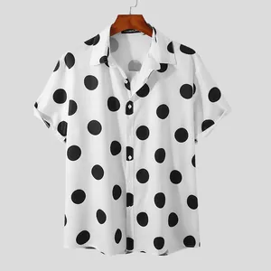 Men's white short-sleeve Hawaiian beach shirt featuring bold black polka dots and slim fit design