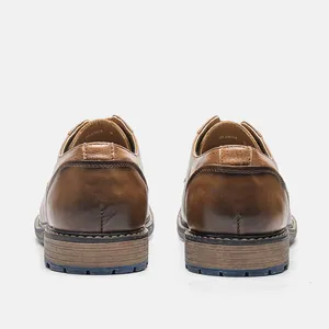 Rear view detail of brown leather business casual shoes with a stylish rubbed finish