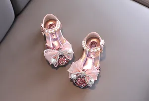 Zapatos de princesa rosa con purpurina para niñas, con lazo y detalles de perlas.