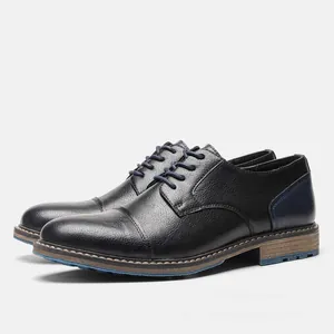 Men's black business casual leather shoes with blue accents and stylish cap-toe.