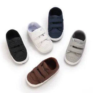 Collection of soft-sole baby walking shoes in five colors with double velcro straps.