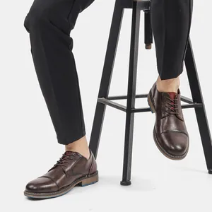 Stylish men's retro dark brown leather business casual derby shoes worn by model