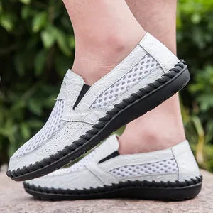 Breathable men's white mesh slip-on loafers with crocodile texture and black sole
