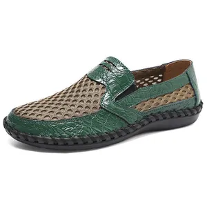 Breathable men's slip-on loafers with green crocodile texture and beige mesh upper.