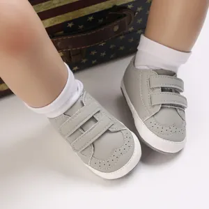 Soft sole grey baby walking shoes with double velcro straps for infants 0-1 year old