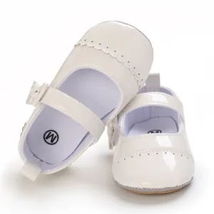 Elegant glossy creamy white baby Mary Jane walking shoes with bow and scalloped trim