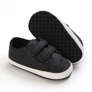 Detail of soft-sole baby walking shoes with anti-slip dots and Velcro closure