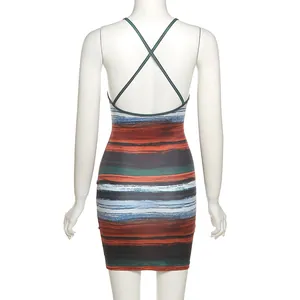 Detailed back view of a sexy backless bodycon dress with criss-cross straps and stripes