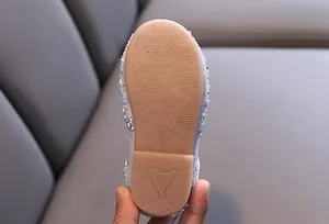 Detail of non-slip rubber sole on girls rhinestone dance flats, size 23