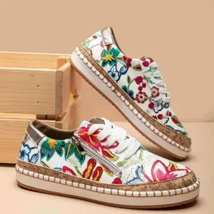 Ethnic floral print thick sole sneakers for women with zipper and lace-up details