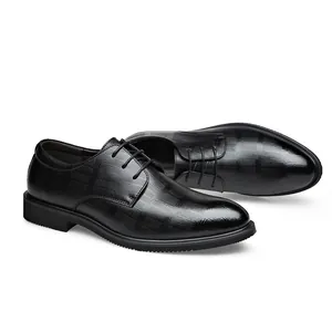 Elegant black textured leather men's dress shoes for formal business or wedding attire.