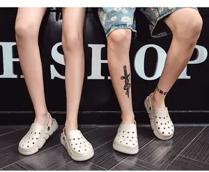 Trendy cream-white summer clogs for men and women, shown being worn by models in a studio.