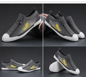 Men's grey breathable mesh casual shoes with yellow feather embroidery and zipper detail