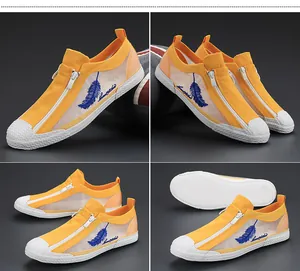 Multi-angle view of men's breathable orange mesh casual shoes with feather embroidery