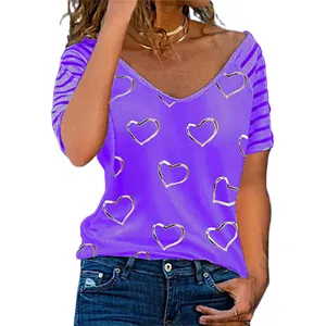 Detail view of purple plus size women's T-shirt with heart print and striped sleeves.