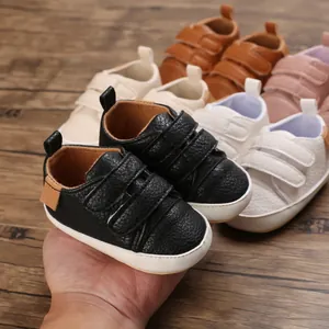 Detailed view of baby soft sole pre-walker shoes in multiple colors for infants