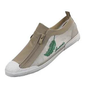 Men's breathable khaki mesh loafers with green feather embroidery and zipper detail.