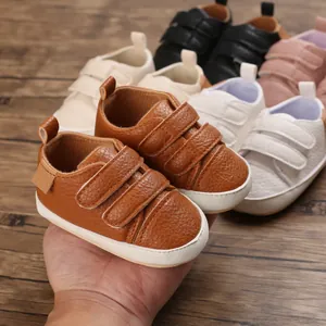 Detailed view of soft-sole infant walking shoes in multiple colors for 0-12 months