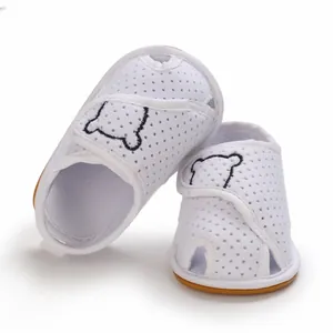 White mesh baby walking sandals with cute cartoon bear pattern and soft rubber sole