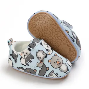 Close-up of soft-sole baby walking shoes with cute animal prints and non-slip bottom