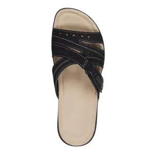 Top view of black women's comfort sandal with carved cross straps and thick sole