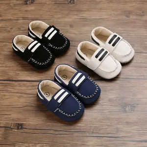 Kollektion hochwertiger Baby Lauflernschuhe mit weicher Sohle in Schwarz Weiß und Blau
