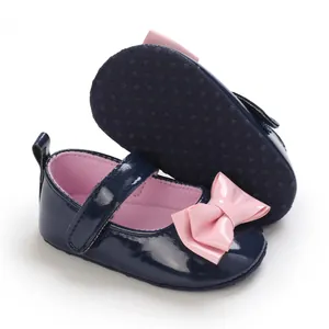 Klassische marineblaue Lauflernschuhe für Baby Mädchen mit rosa Schleife und Weichsohle