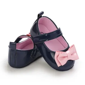 Elegante dunkelblaue Lauflernschuhe für Baby-Mädchen mit weicher Sohle und rosa Schleife