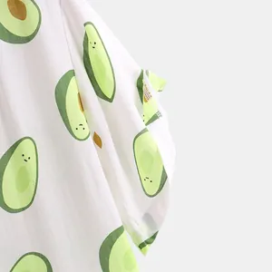 Men's casual Hawaiian beach shirt with cute green avocado print on white fabric