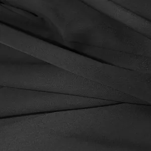Inquadratura macro di alta qualità della trama del tessuto twill nero elegante.