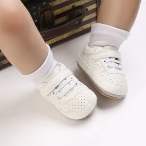 Zapatos blancos para bebés con suelas de goma blandas y velcro para niños de 0 a 1 año.