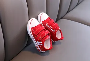 Chaussures en toile rouges pour enfants avec motif lapin et semelle souple
