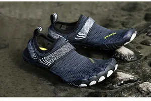 Detail of blue quick-dry barefoot water shoes with non-slip rubber five-finger soles