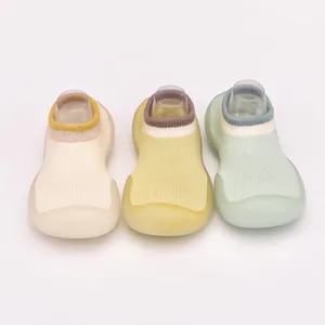 Breathable soft sole baby walking sock shoes in three soft pastel cream yellow and mint colors