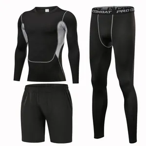 Detail view of a 3-piece men's black compression sports suit with grey stitching